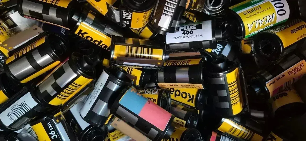 35mm film photography — Kodak film rolls on a table