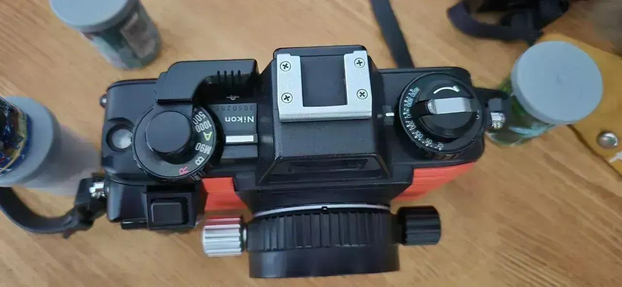 Nikonos V top plate detail — shutter speed dial and film advance lever